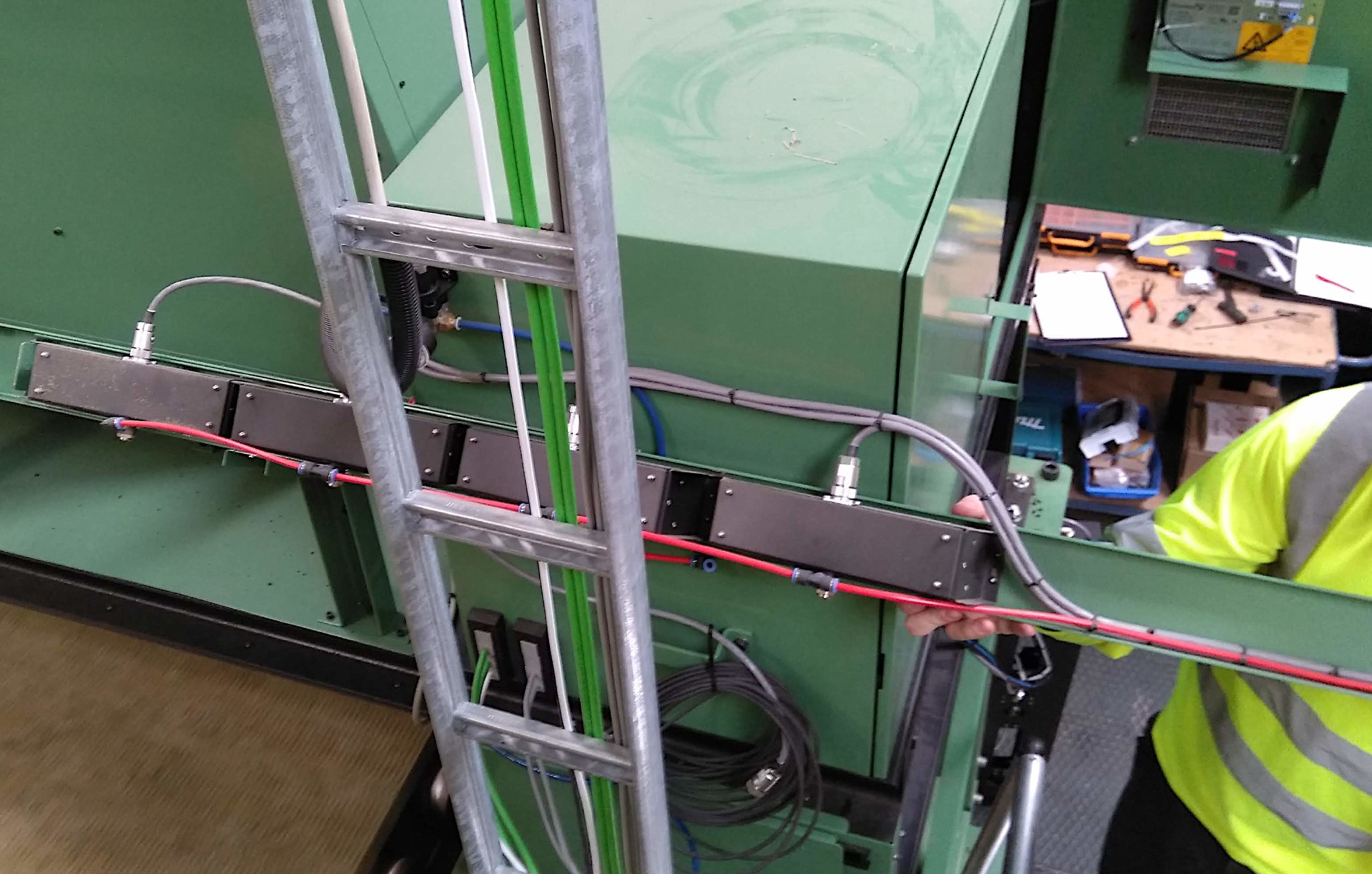 Servicing the lights on a running line